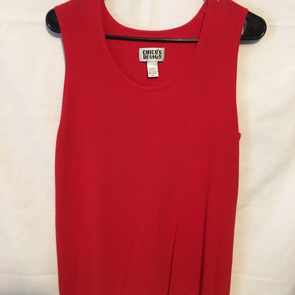Red Sleeveless top made of Rayon and nylon.
